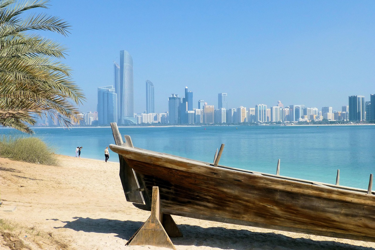 Clean daylight Dubai skyline over blue water